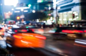Nighttime traffic in a city blurred out to simulate what a person with blurry vision see's