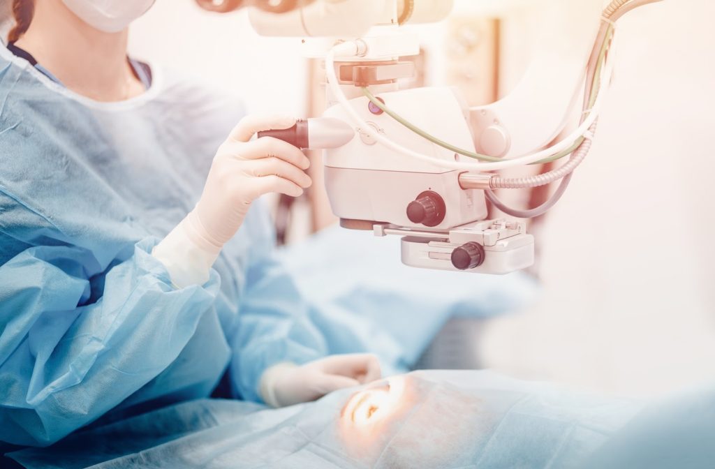 Doctor performing Lasik eye surgery procedure on a patient