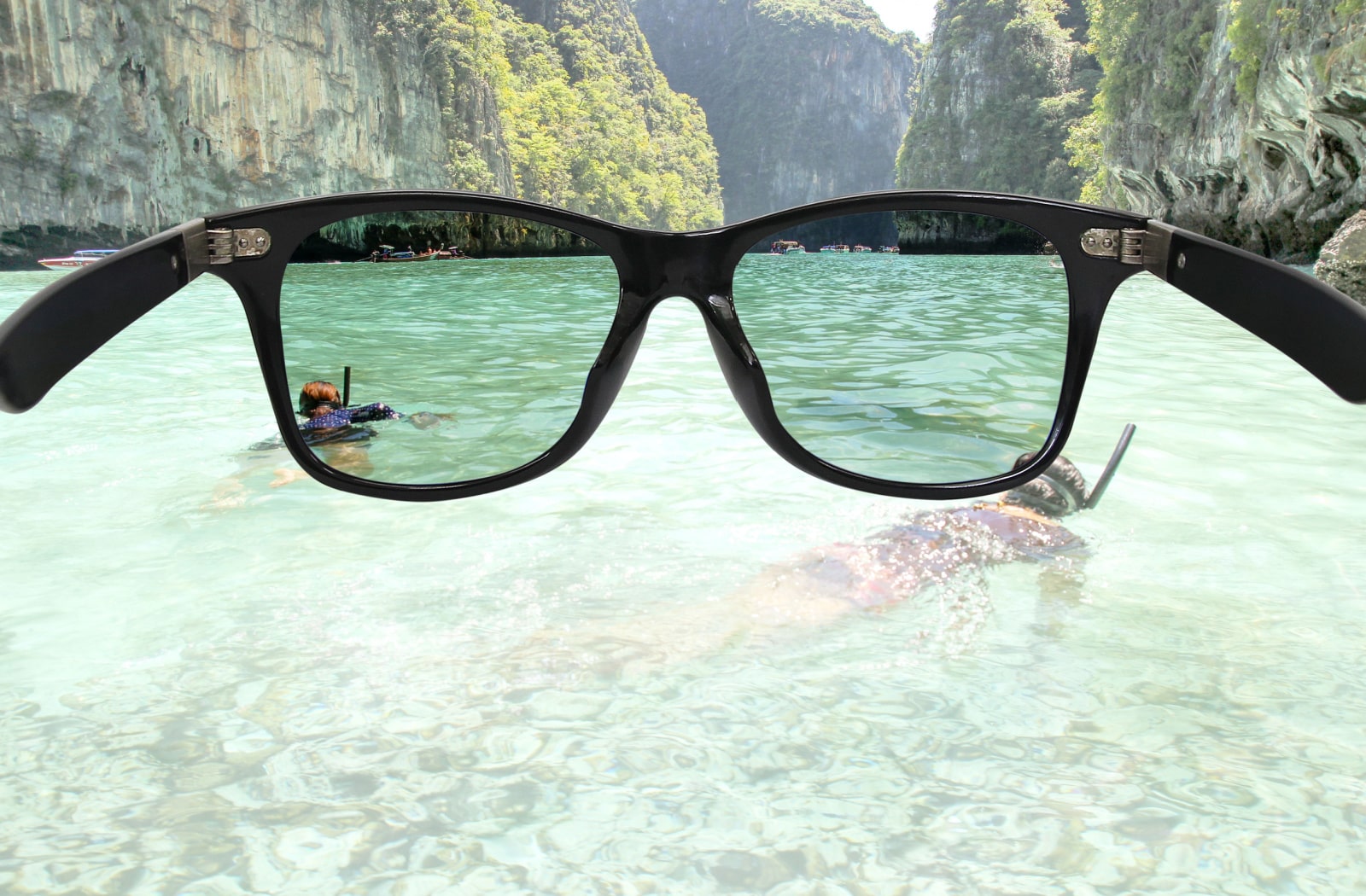 A close-up of polarized sunglasses reducing the glare from water.